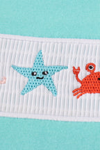 Blue marine creature embroidery smocked top