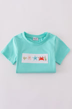 Blue marine creature embroidery smocked top