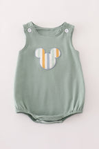 Green character applique bubble