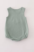 Green character applique bubble