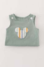 Green character applique bubble