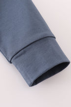 Navy character embroidery zip pull over