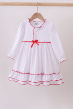 White bow ruffle gown