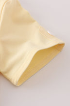 Yellow character applique shorts set