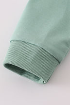 Sage duck sequin mom&me top