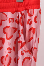 Red heart print bamboo pants